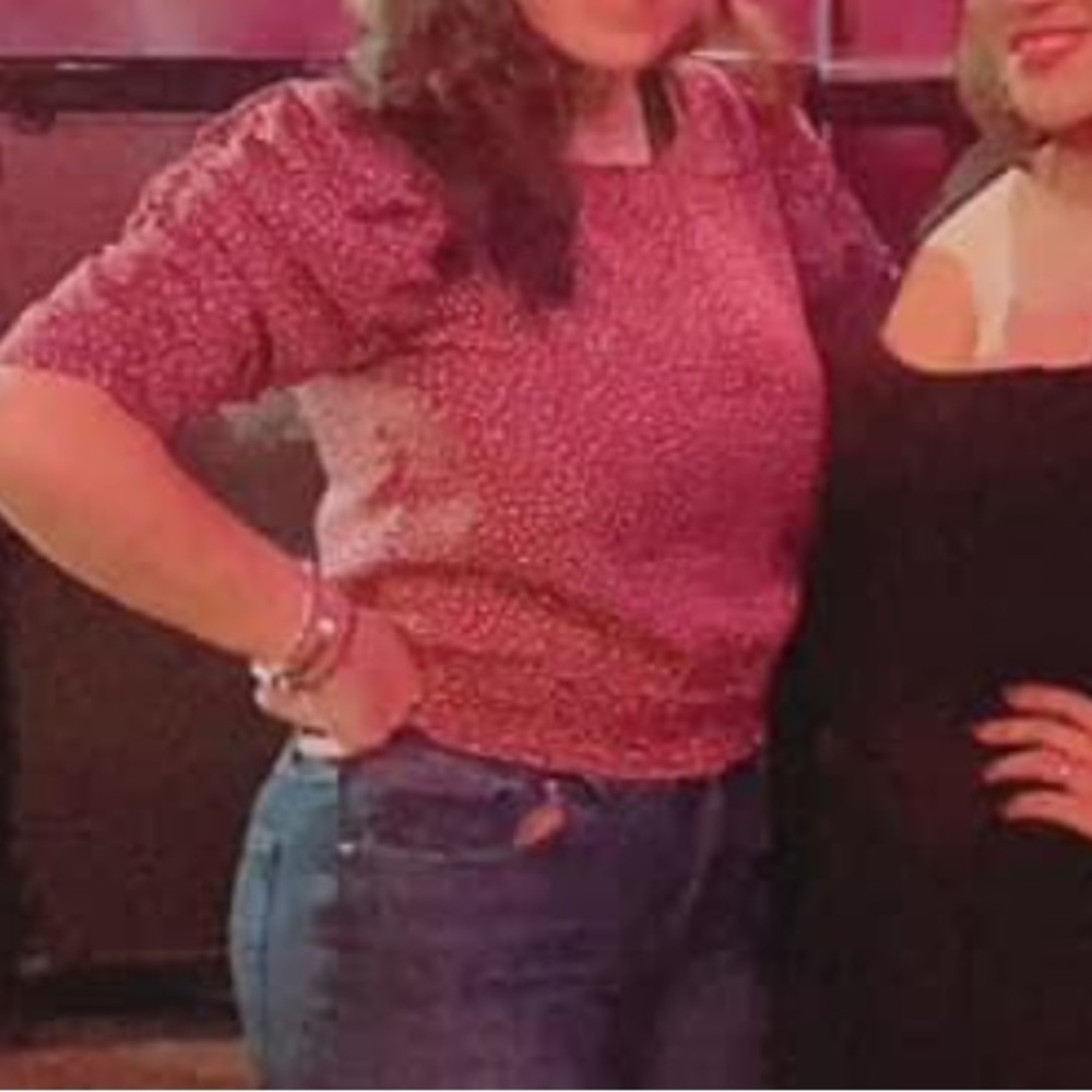 The color is somewhat between brown and burgundy.